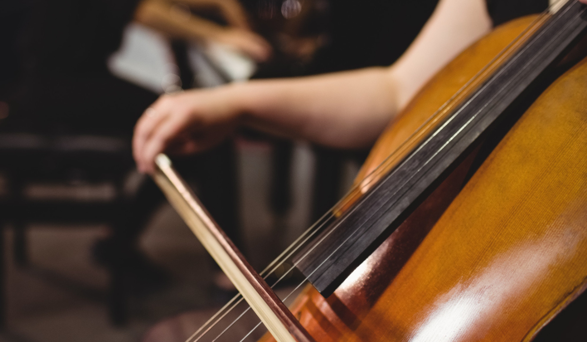 Close up of a person playing cello