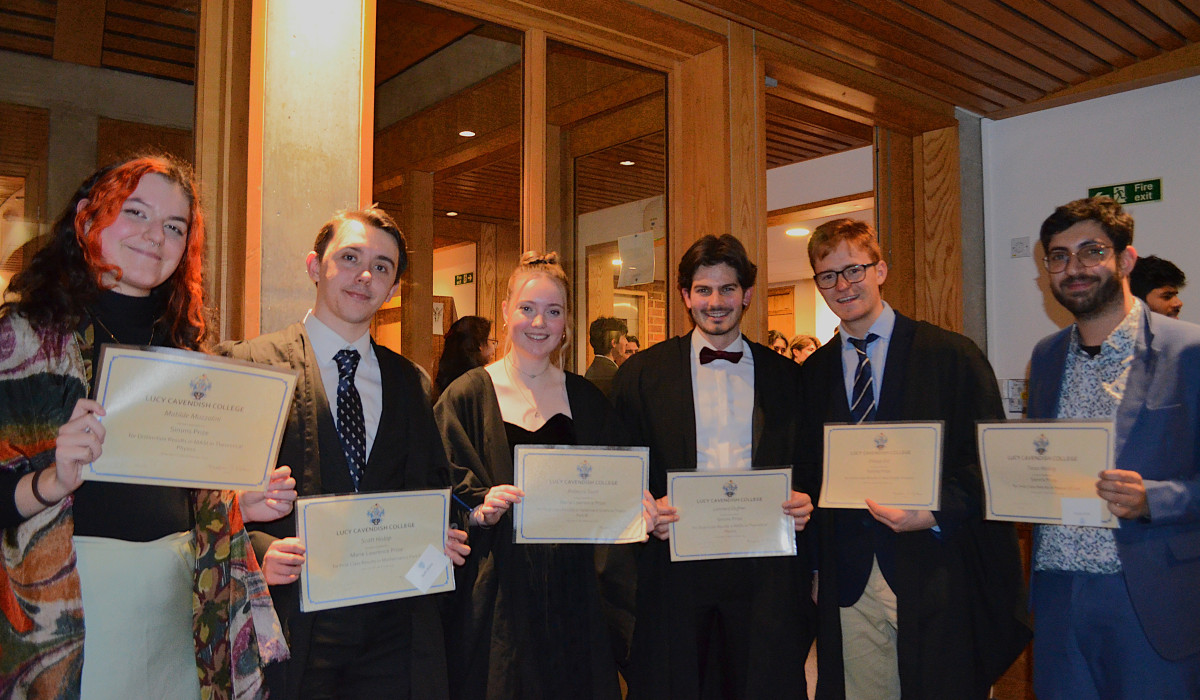 6 students holding prize certificates