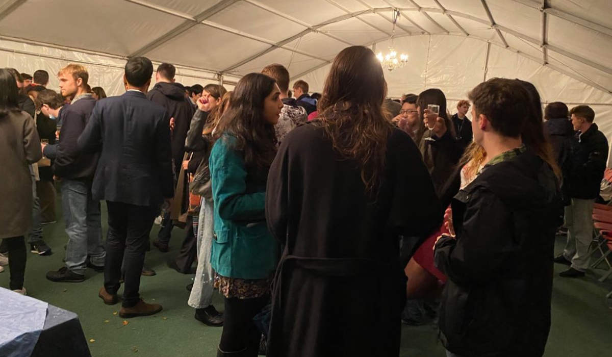 Group of students at drinks reception in College