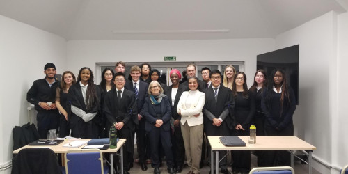 Moot court competition Participants and judges posing for group photo